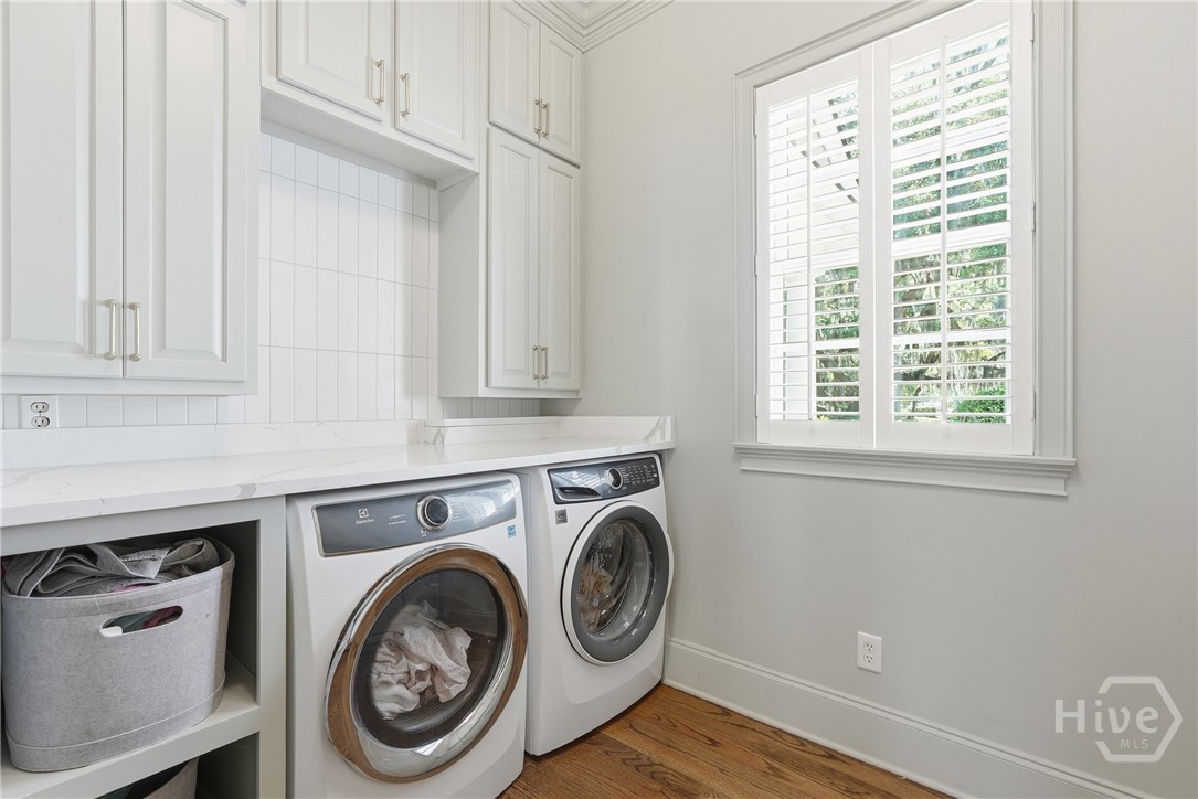 Laundry room with new cabinets, laundry sink