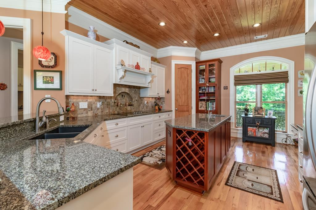 Kitchen - granite counters - wine rack