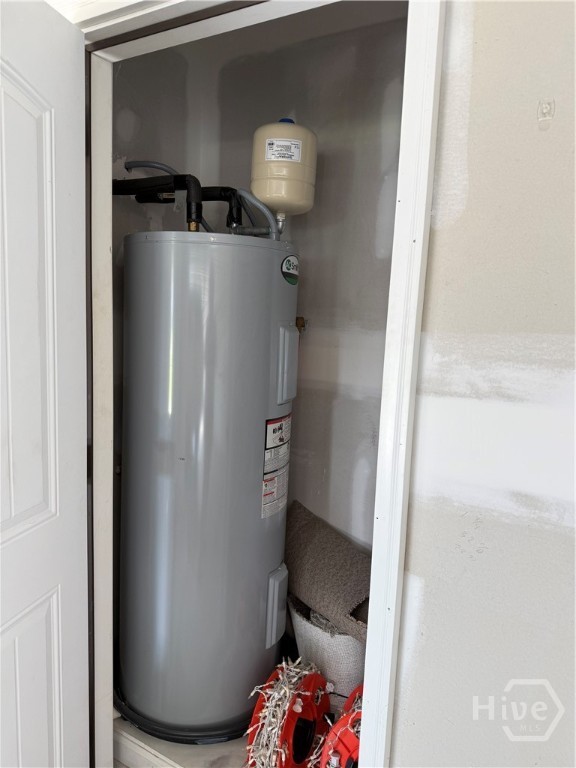 Extra large hot water heater in garage storage