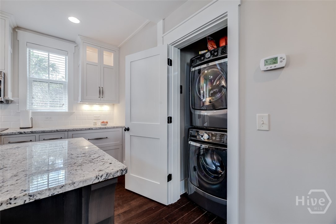 Stacked laundry closet in the cottage