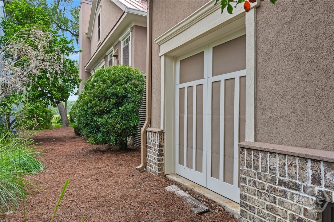 Golf cart garage on the left side of the home.