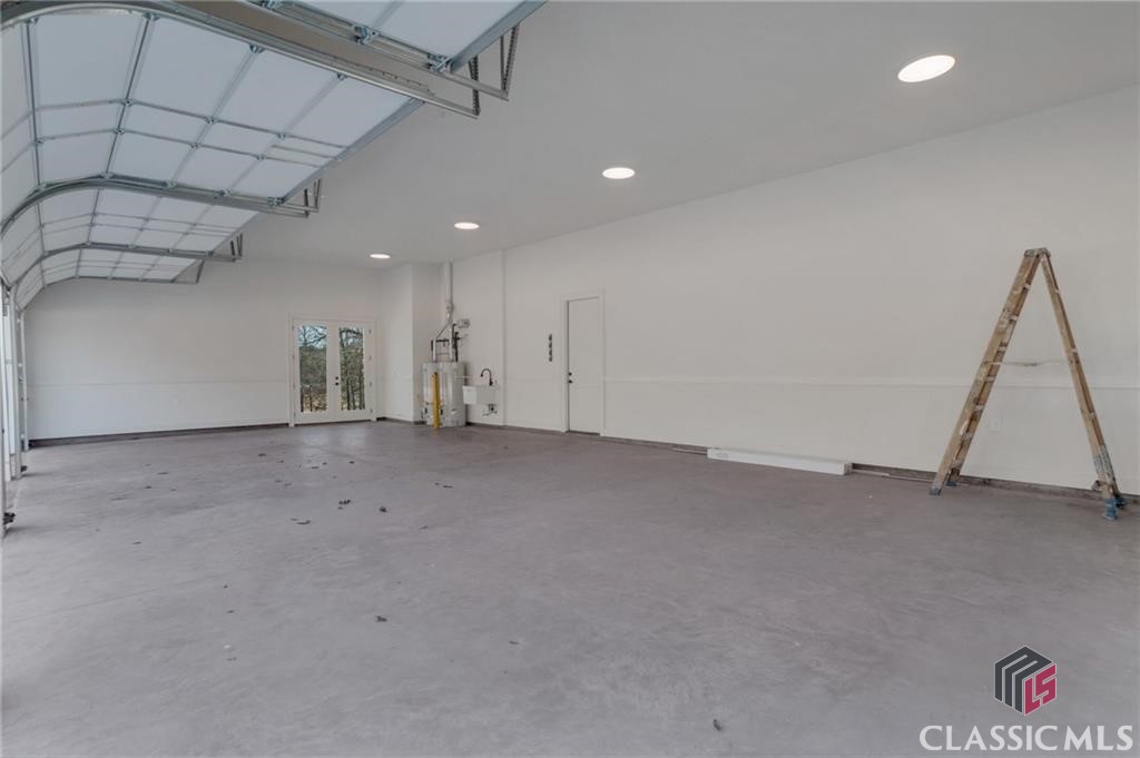 Garage - FOUR car garage with sink and 2 water heaters!