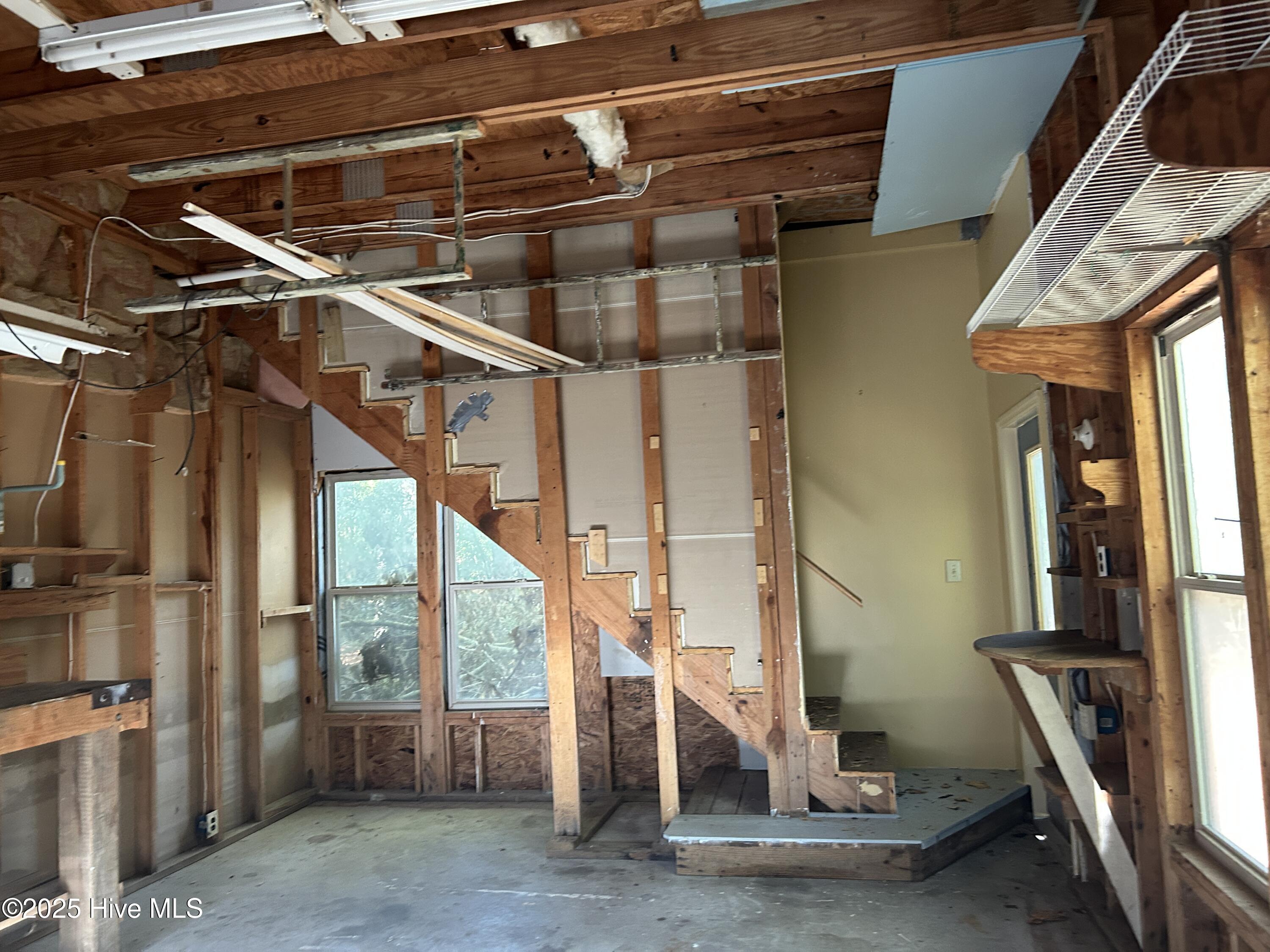 2nd Stall of garage, stairs lead to room above the garage.