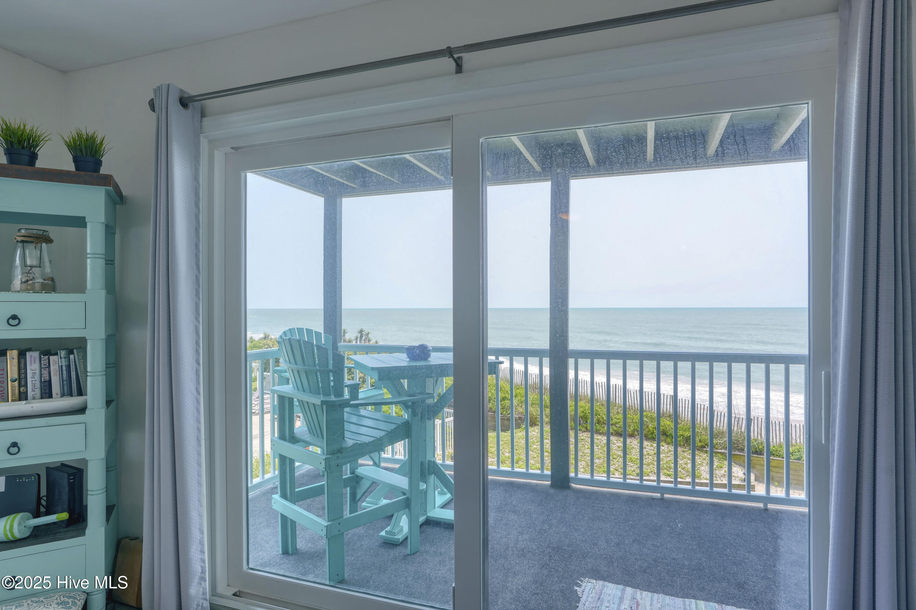 1896 New River Inlet Road Unit 1212, North Topsail Beach, NC 28460 – photo 11: Living Room View to Deck