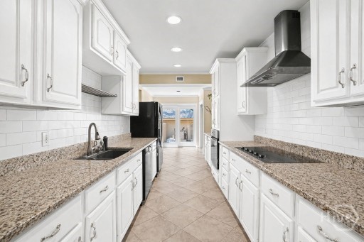 Virtually Staged - provides an example of painting kitchen cabinets and backsplash