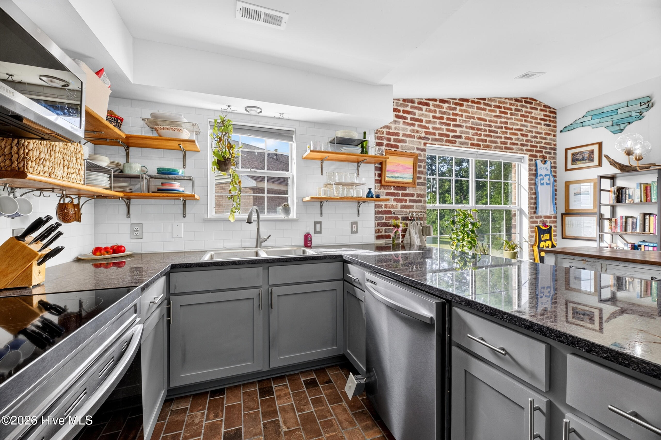 Brick floors in kitchen - so cool!