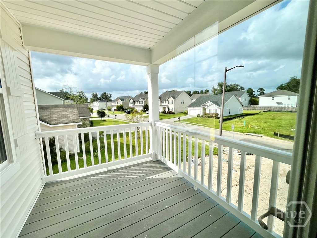 Private balcony off primary bedroom.