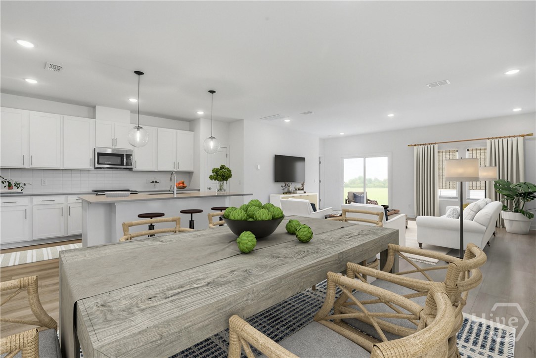 Image shown for design reference. Actual home will feature gray cabinetry with Carrera Miska Countertops. See sales consultant for details.