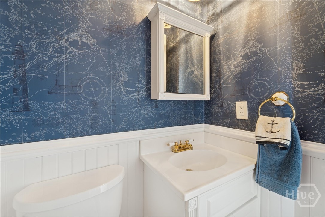 A guest powder room downstairs.