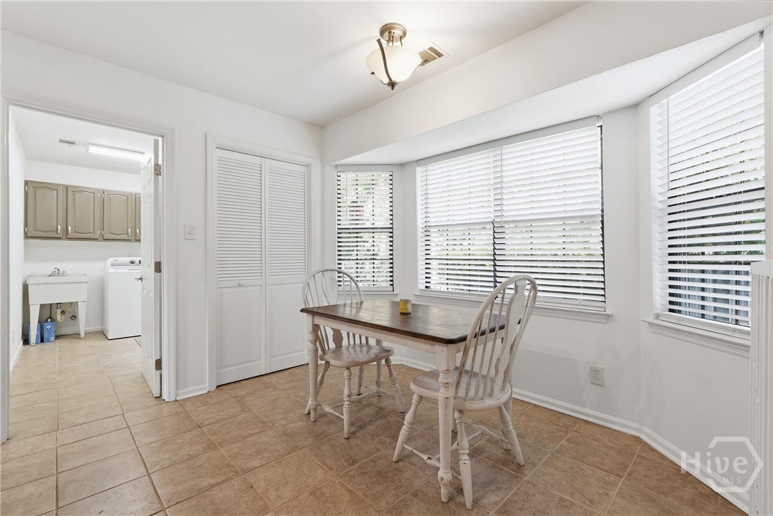 Breakfast nook off of the kitchen has beautiful vi
