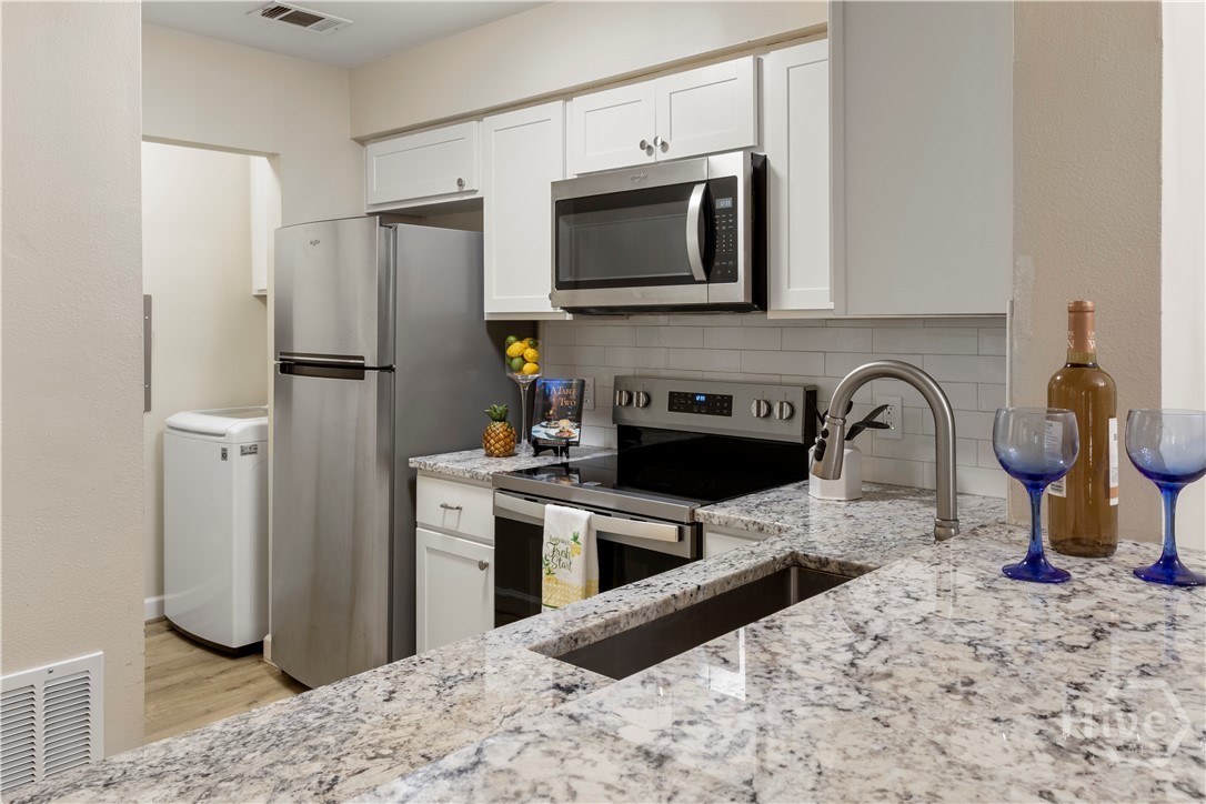 Nice granite Kitchen with Stainless Steel.