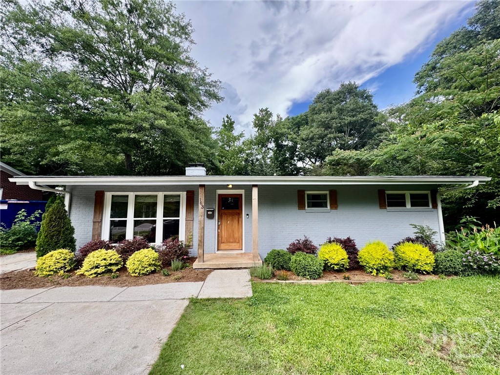 Sold before published. 4/3.5 brick home in 5-Points, with 2 master suites, located within 1 block of UGA intramural fields/campus. Stylish kitchen with granite counters, tile backsplash, island with cooktop and pendent lighting, wall oven, and arched opening to LR. Living room features a fireplace with reclaimed wood mantle and accent wall. Separate dining room. Private rear deck overlooks a lovely backyard which has a wood privacy fence, a stone courtyard, terraced greenspace, garden beds, and an outbuilding that can serve as storage area, workshop, or studio space. This is a wonderfully central location, within blocks of 5-Points restaurants, coffee, pubs, entertainment, as well as UGA bus service.