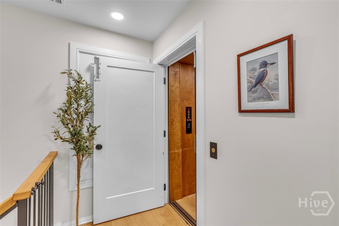 Entrance to elevator from carriage house