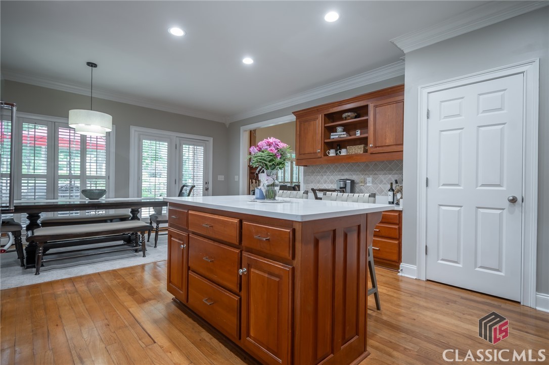 Kitchen with Island and new recessed lighting
