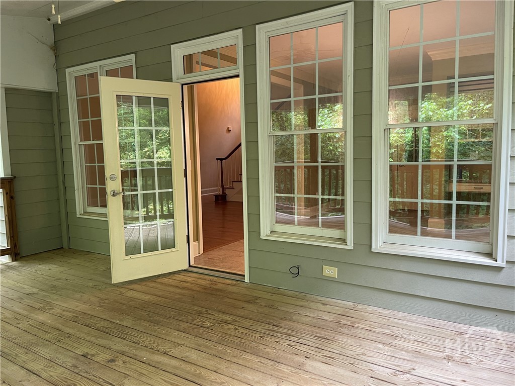 from family room to deck overlooking bkyd