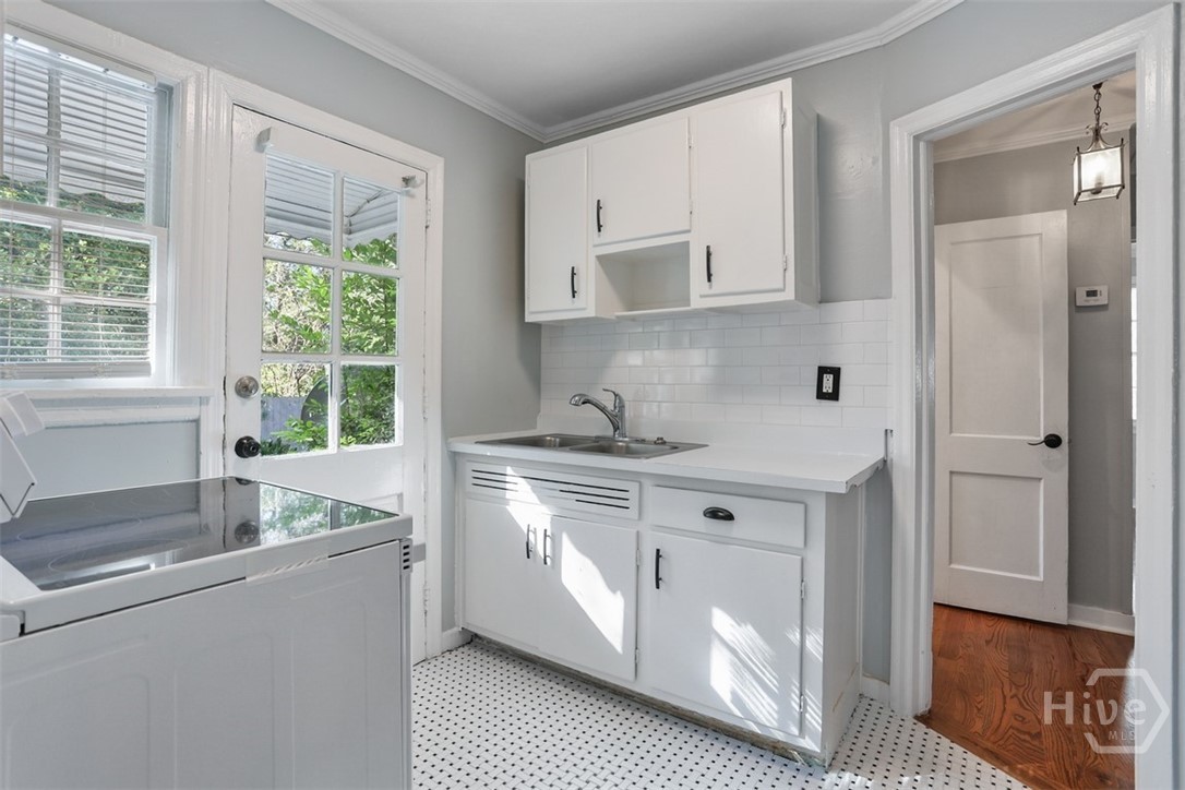 Delightful kitchen with tile flooring.