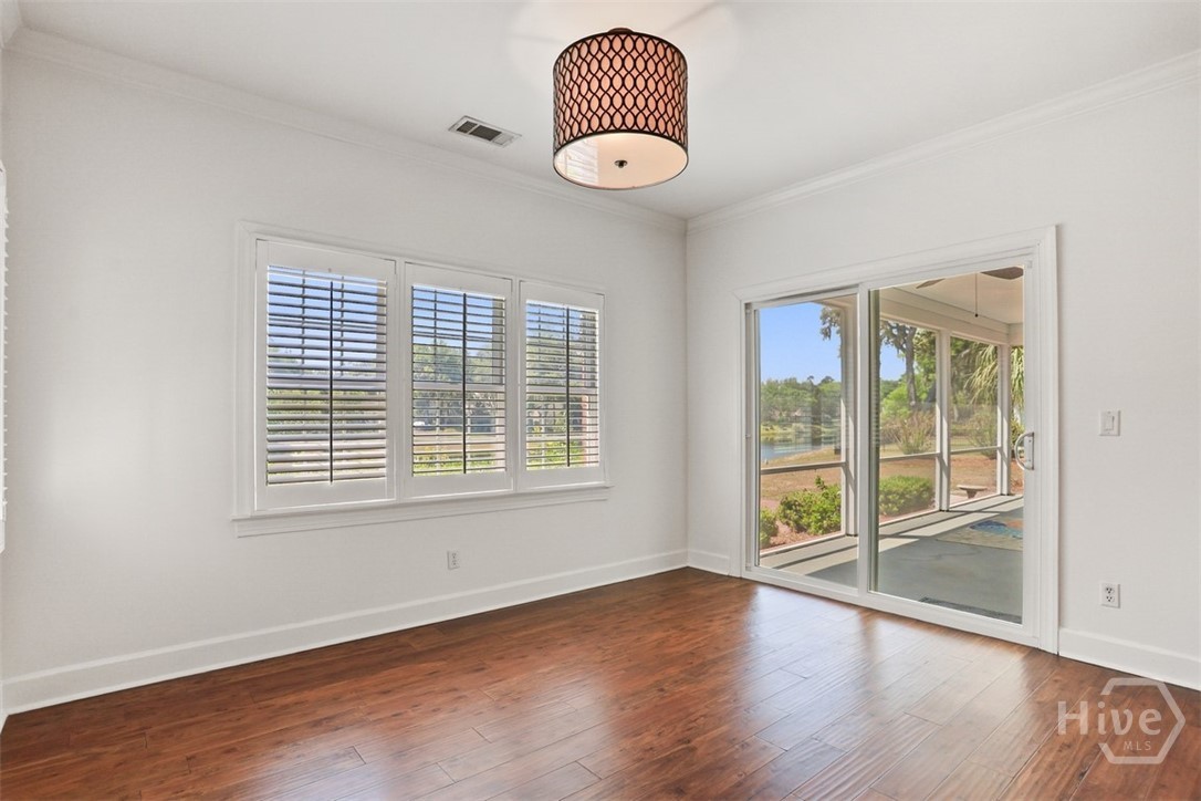 Patio door to screen porch from breakfast area