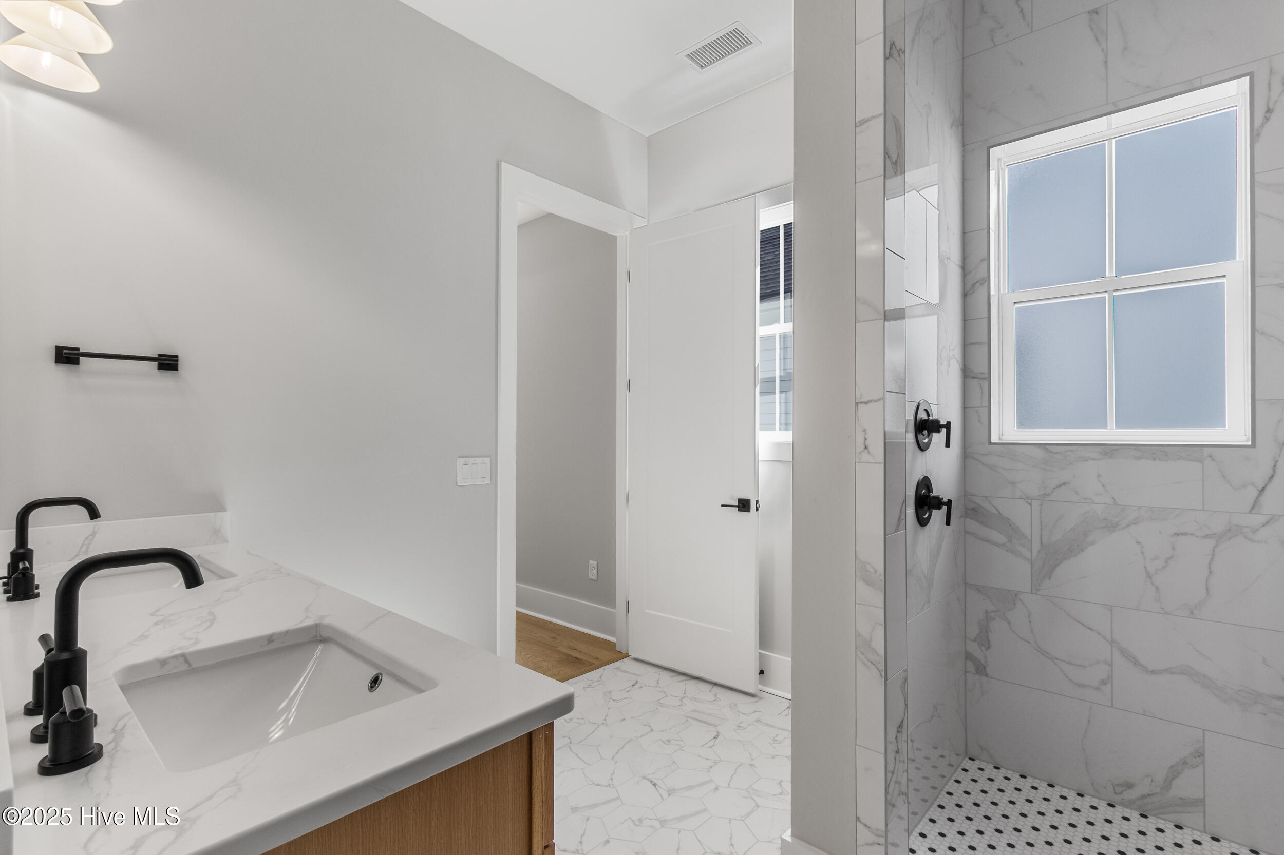 Dual vanity with custom tile work