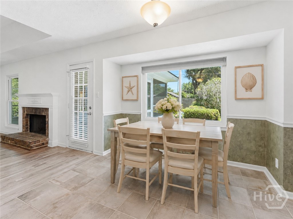 Eat in kitchen has been virtually staged.