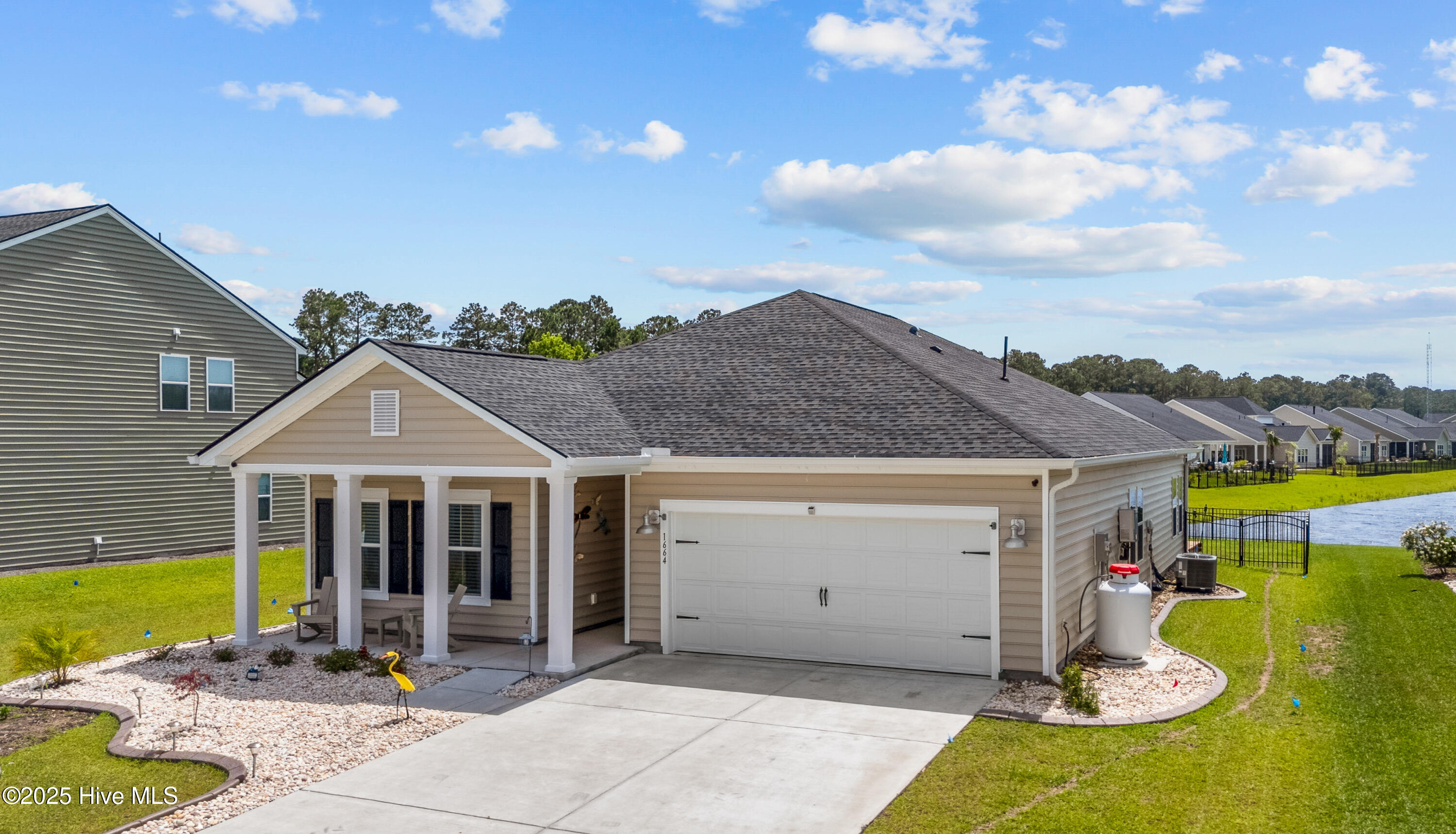 1664 White Starfish Court, Calabash, NC 28467 – photo 3: DJI_20250515143531_0031_D