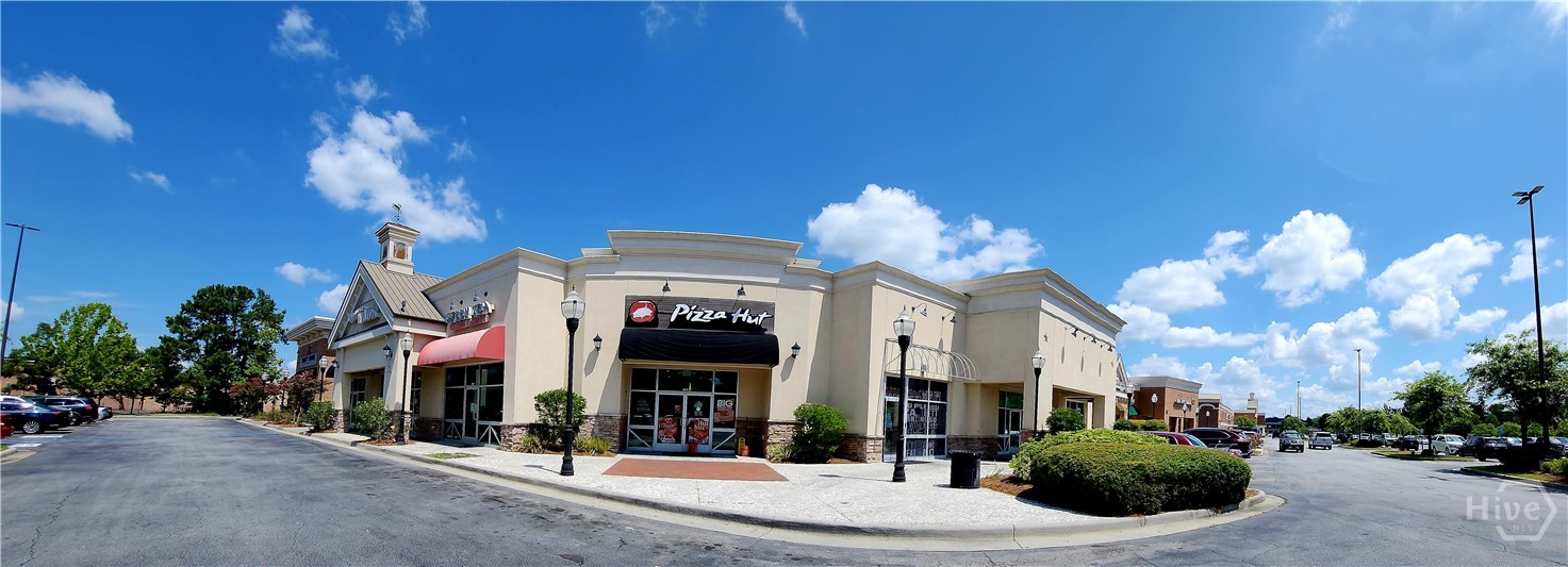 Super Kroger anchors the shopping area with other stores including Starbucks, McDonalds, Wells Fargo, CVS, Car Wash and Hardware Store on North End.