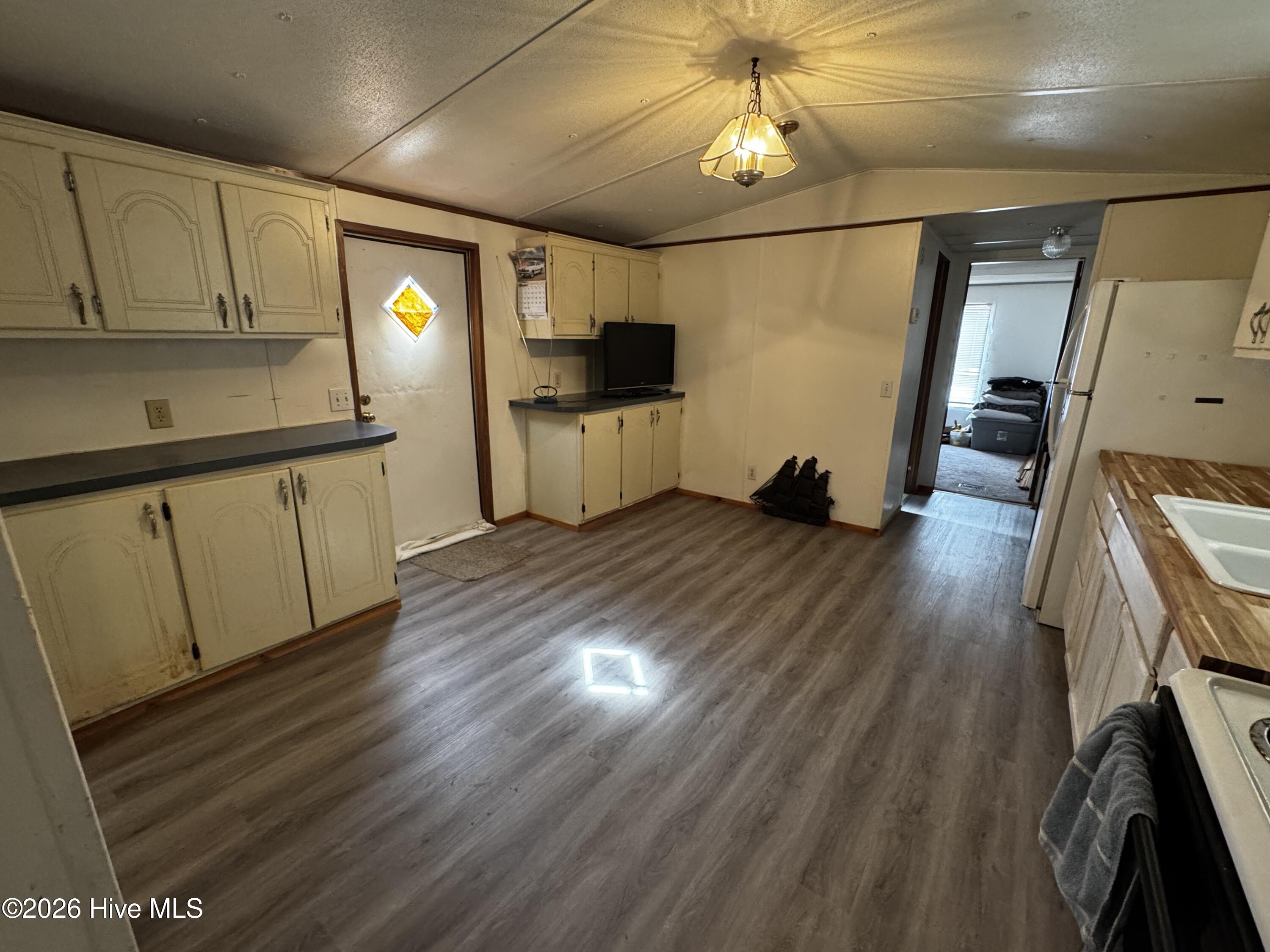 Kitchen with updated plank flooring