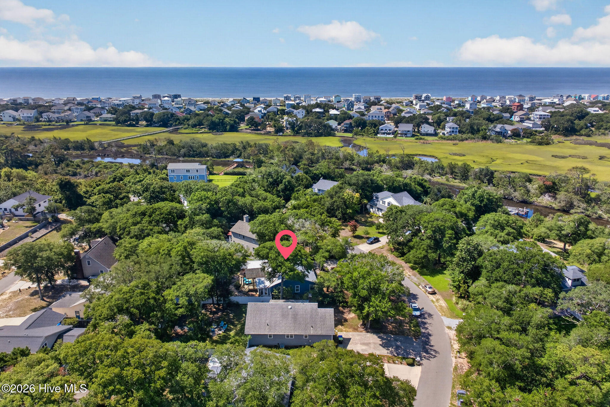 Exterior photo of 108 Paula Circle SE, Oak Island, NC 28465. MLS: 100597384