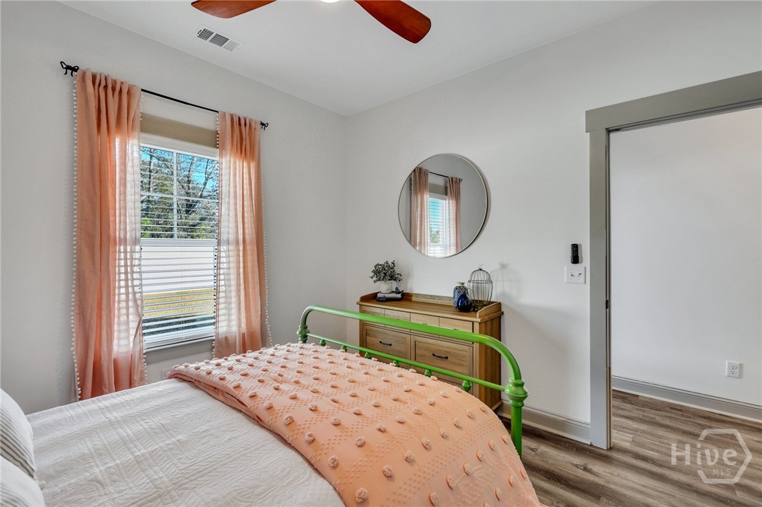 PHOTOS OF A PREVIOUSLY BUILT BRINSON PLAN BY LAWRENCE ALEXANDER HOMES.