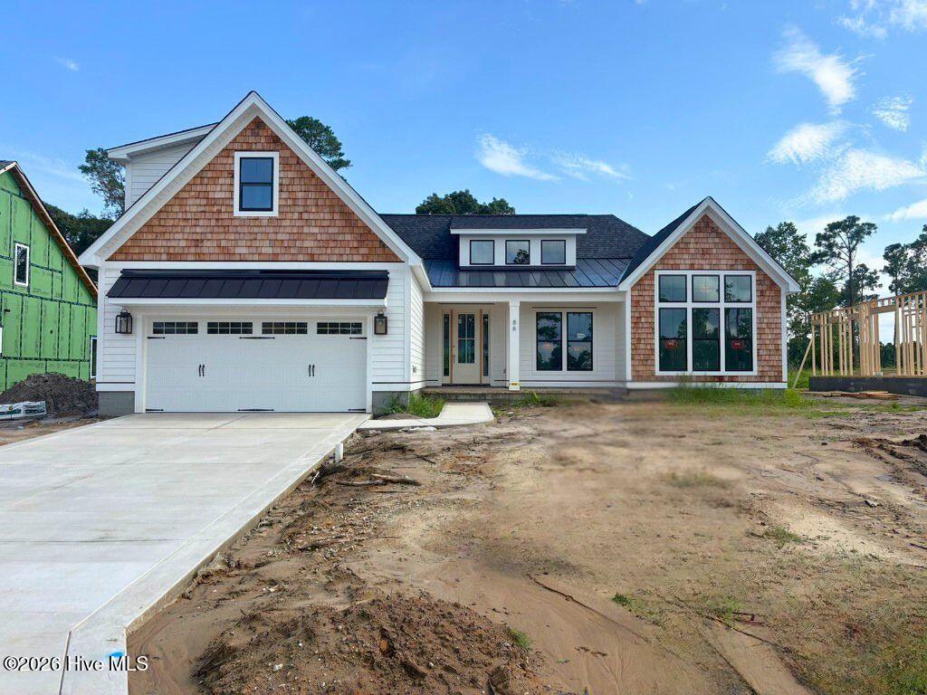 Exterior photo of 86 Delphi Trace, Hampstead, NC 28443. MLS: 100571042
