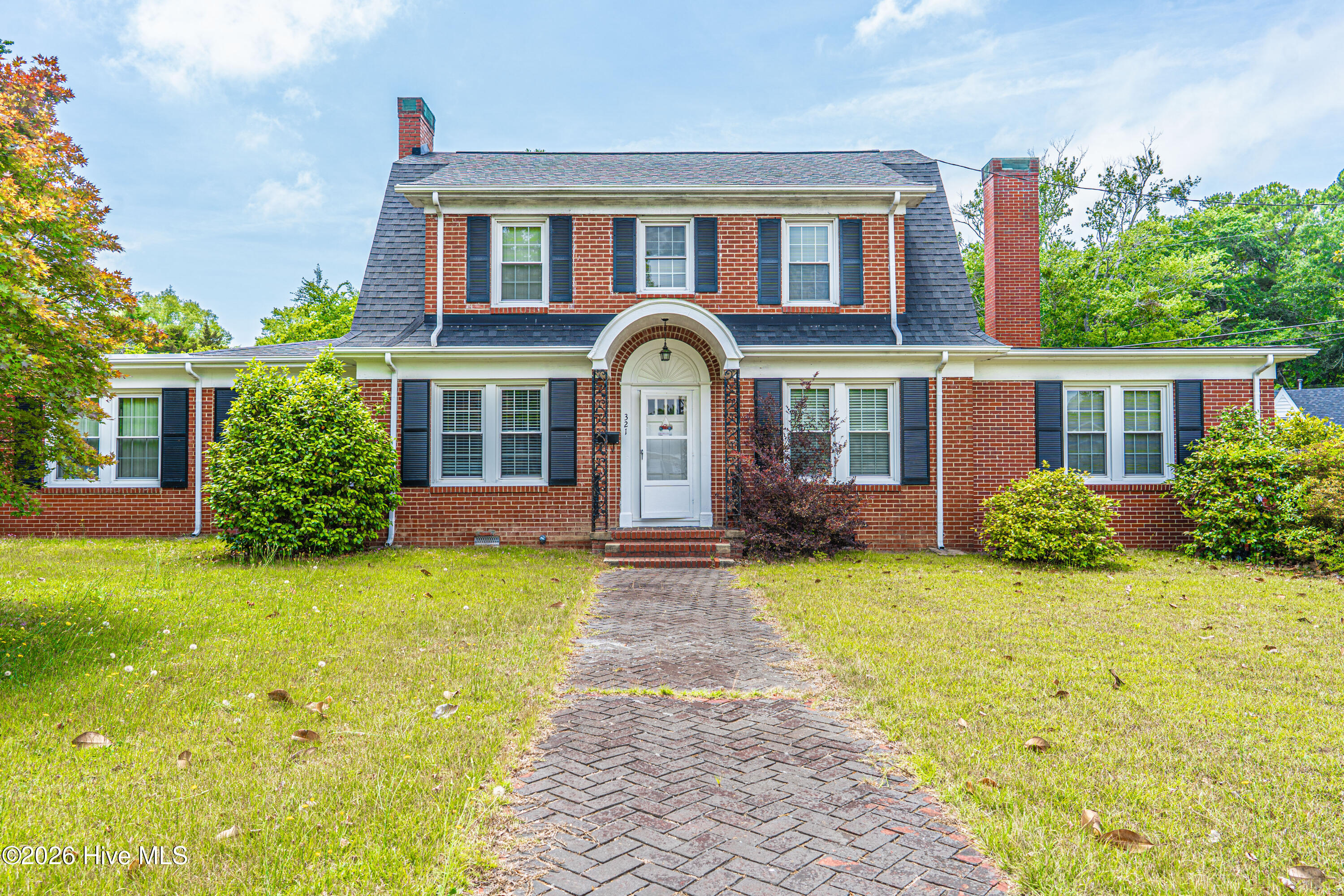 Experience timeless charm and spacious living in this beautifully maintained Rockingham home offering nearly 3,000 heated square feet in a highly desirable location. This elegant residence features 3 bedrooms, 2.5 bathrooms, multiple living spaces, and refined details throughout.The main level includes a welcoming foyer, formal dining room, spacious living room with fireplace, large kitchen with mudroom, private primary suite, study, and a cozy den with custom built-ins and a second fireplace. A heated and cooled sunroom provides the perfect year-round retreat.Upstairs offers two generously sized bedrooms, a full bath, and abundant storage. From the refinished hardwood floors and graceful staircase to the stately curb appeal, this home blends comfort, character, and classic Southern elegance.Schedule your private showing today.