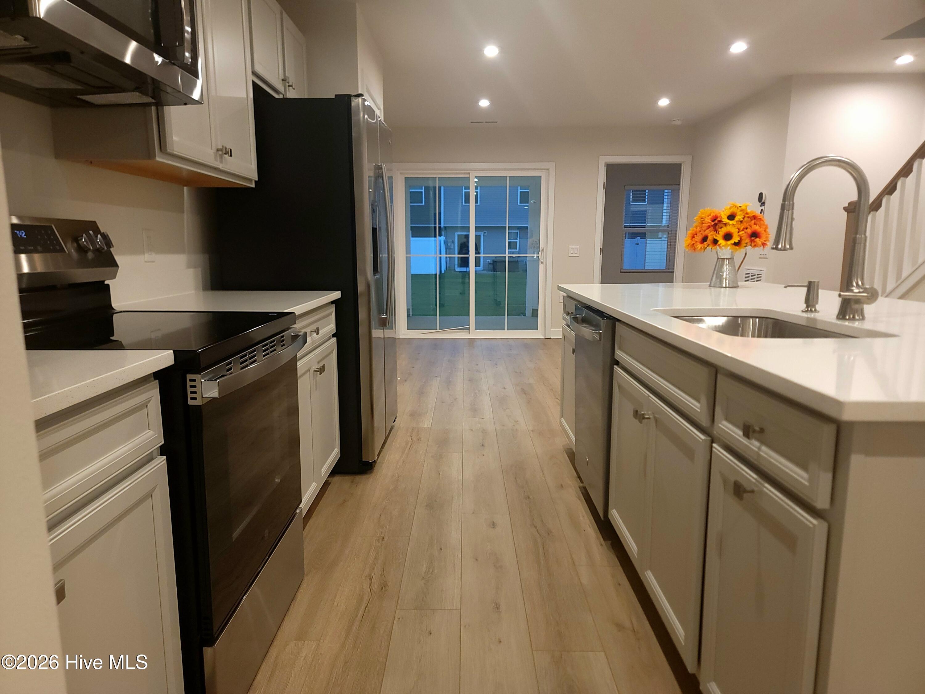 Kitchen work area. All stainless appliances.
