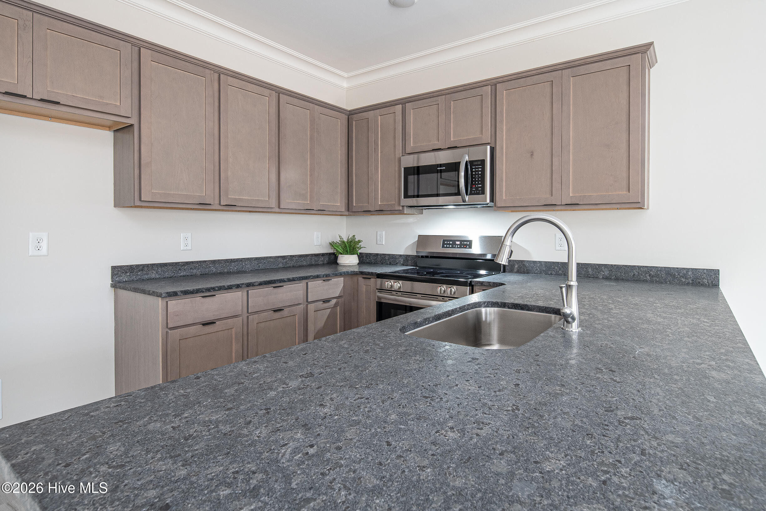 A side cabinets and leathered granite