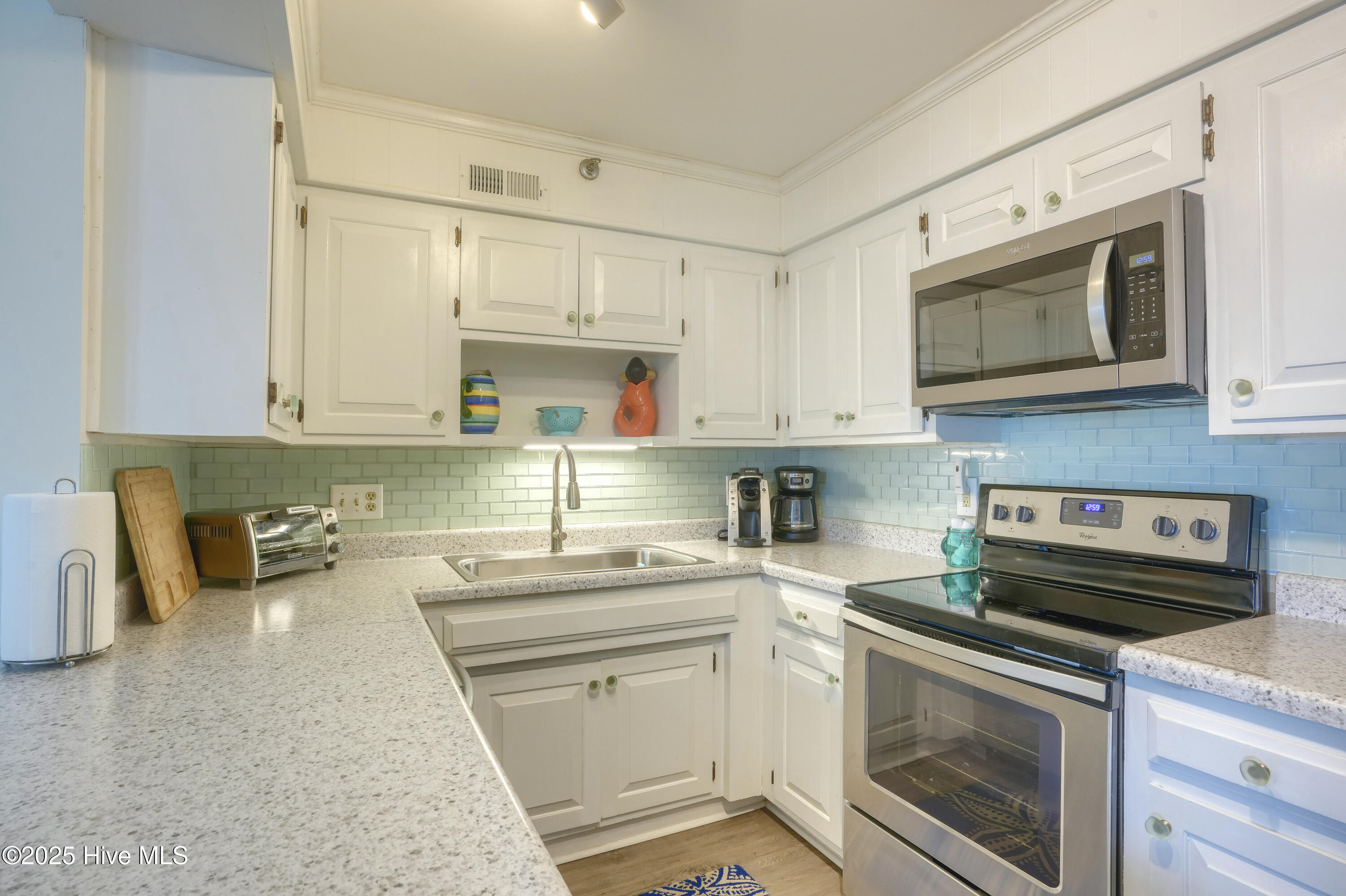 1896 New River Inlet Road Unit 1212, North Topsail Beach, NC 28460 – photo 7: 1212 Shipwatch - Interior - Edited_1