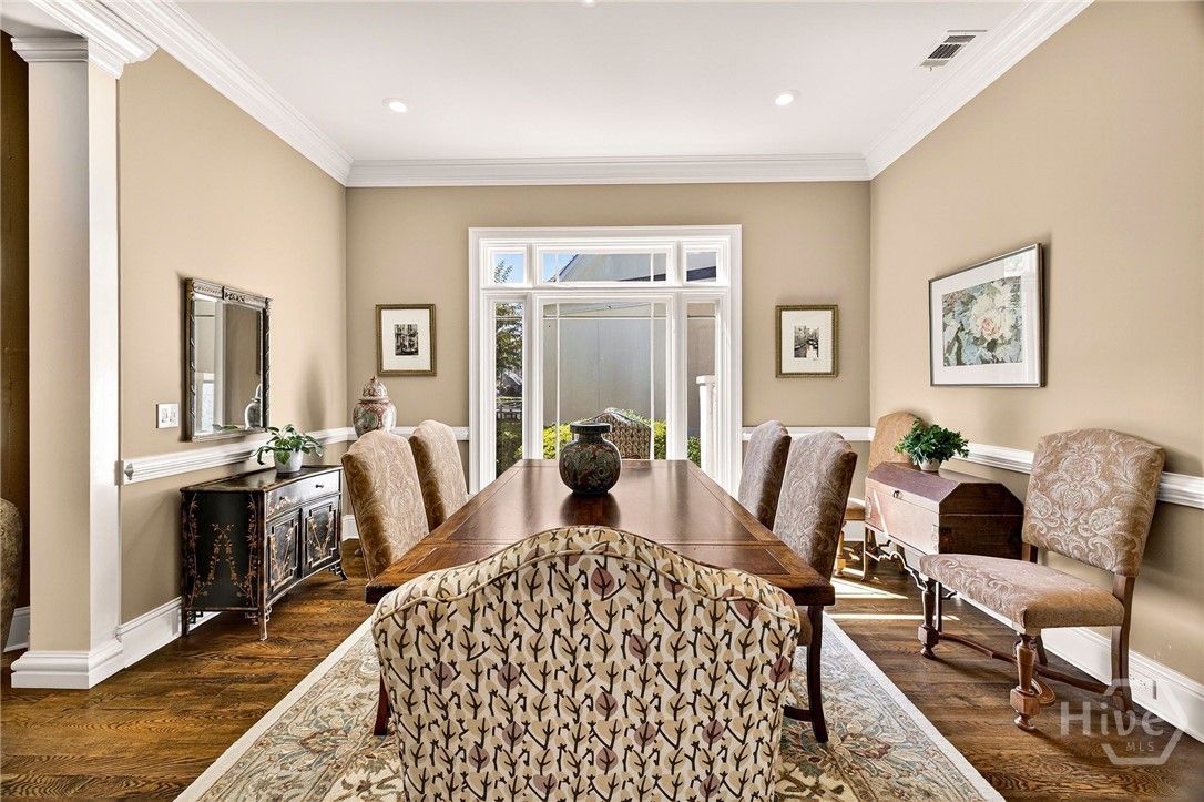 On the right is the dining room overlooking the la