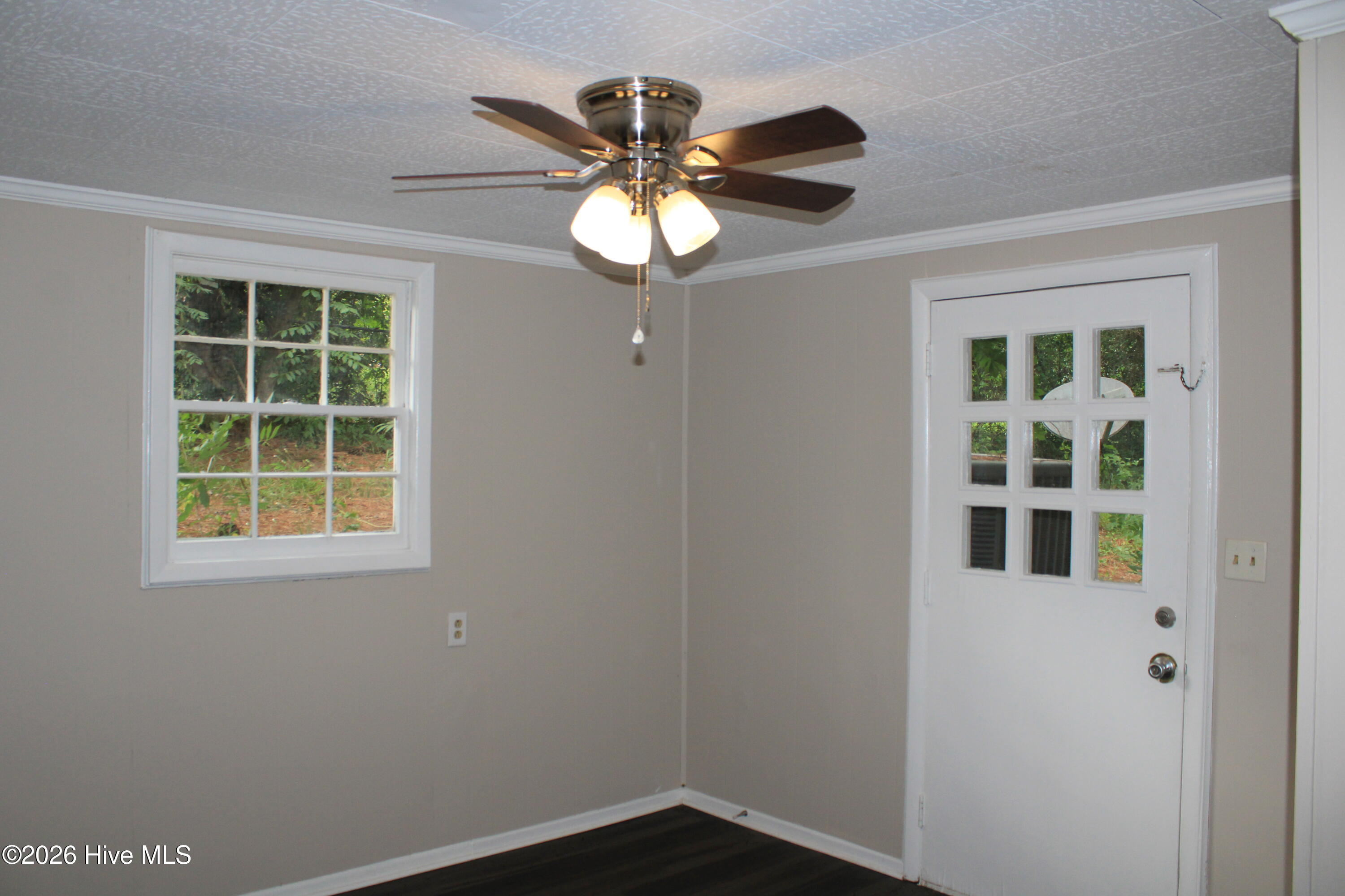 Exit To Rear Covered Patio