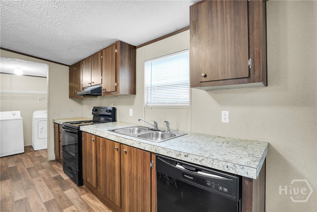 Kitchen with window to view the back yard