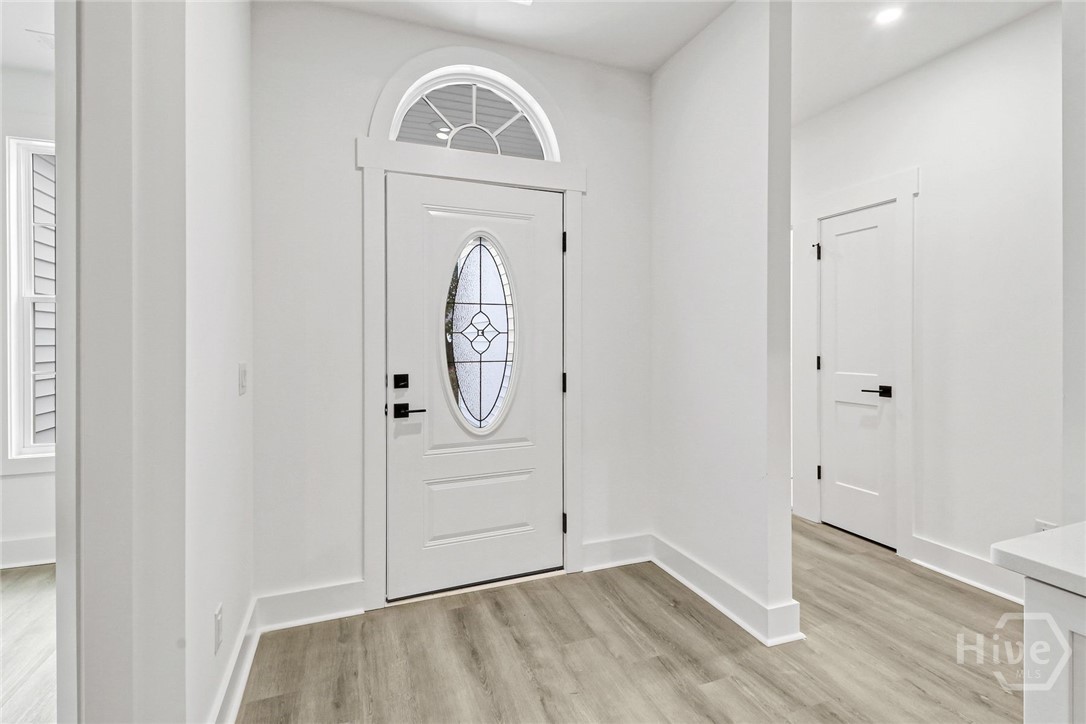 Front Entry - bedrooms to the right and office to the left.