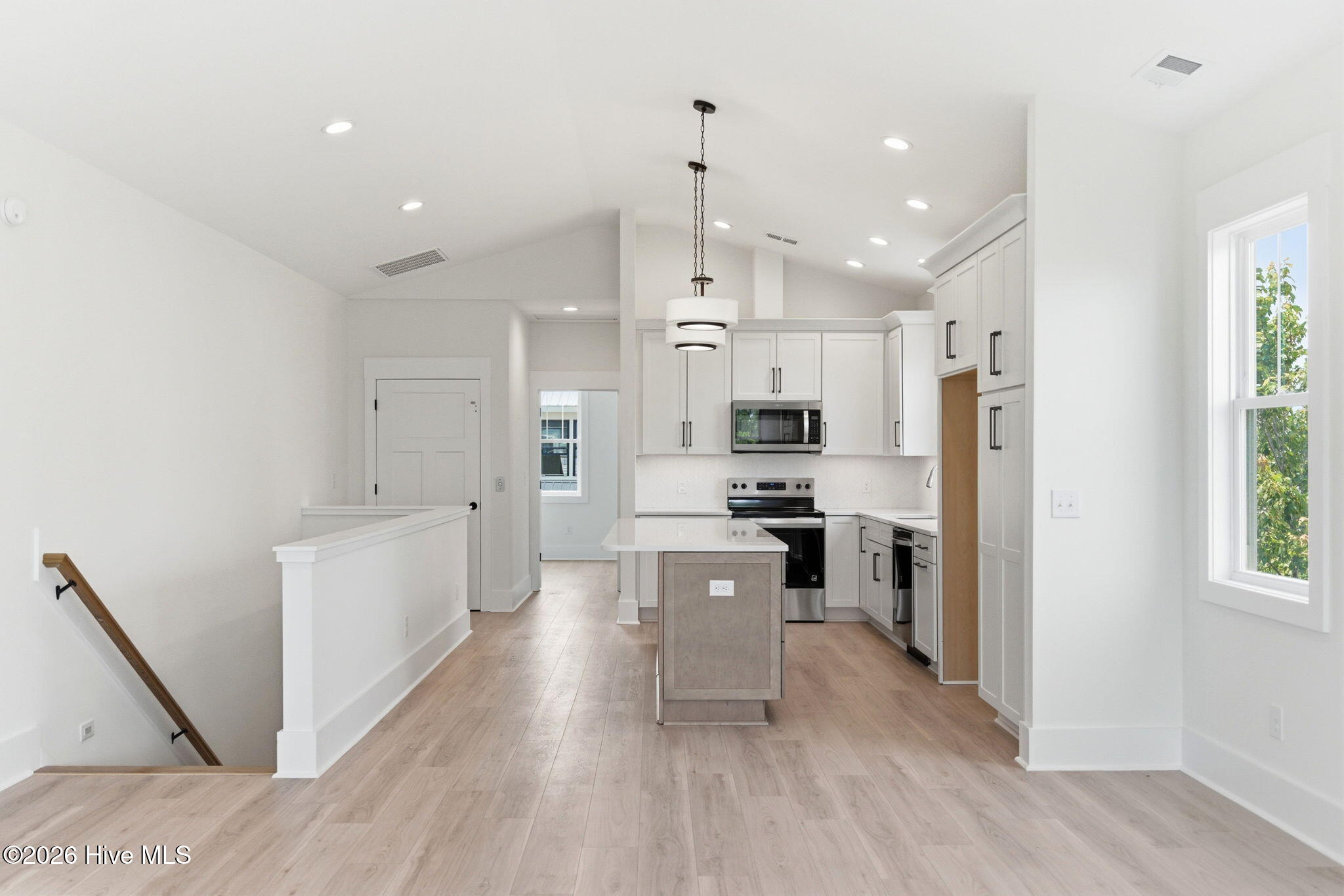 Timeless Kitchen with oversized island and brand new stainless steel appliances