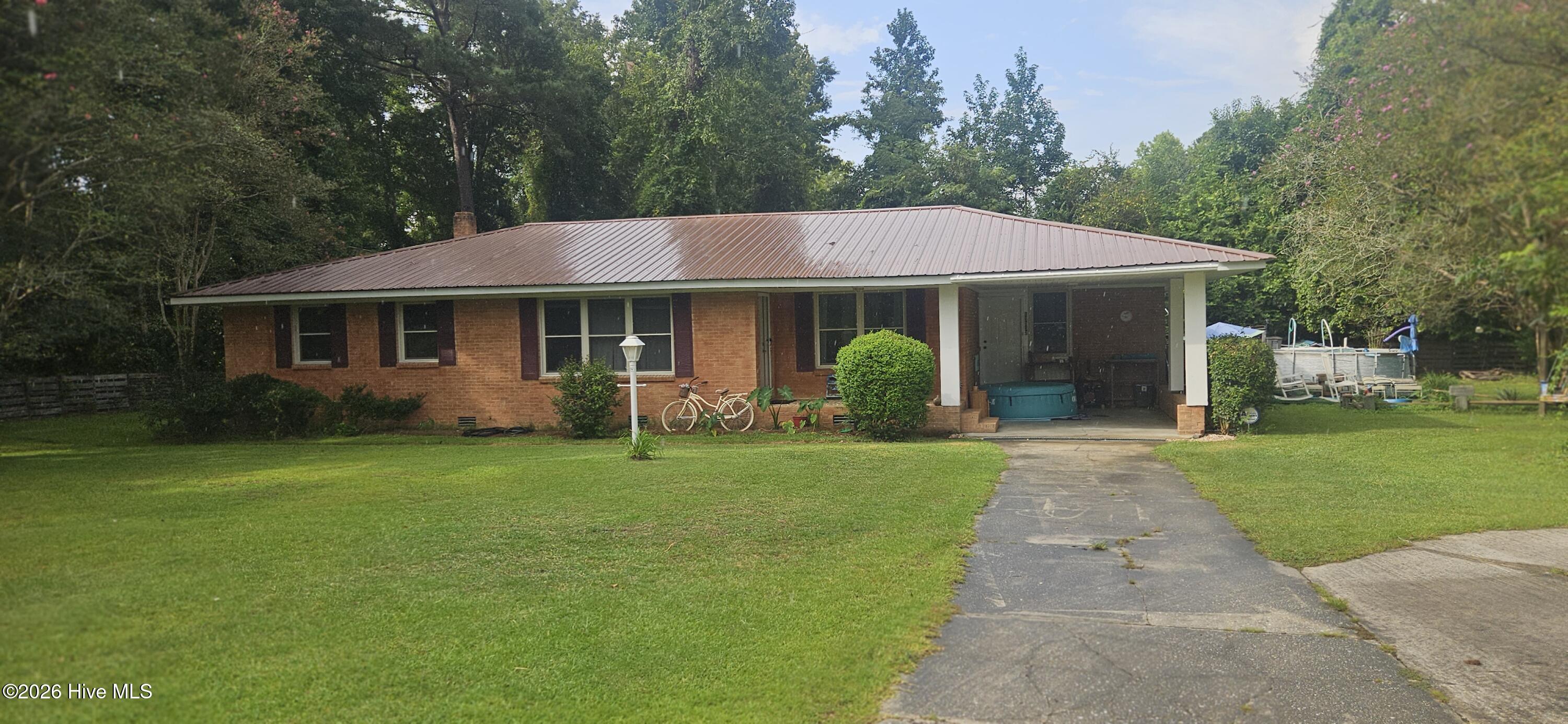 Exterior photo of 13303 Swamp Fox Highway E, Tabor City, NC 28463. MLS: 100601095