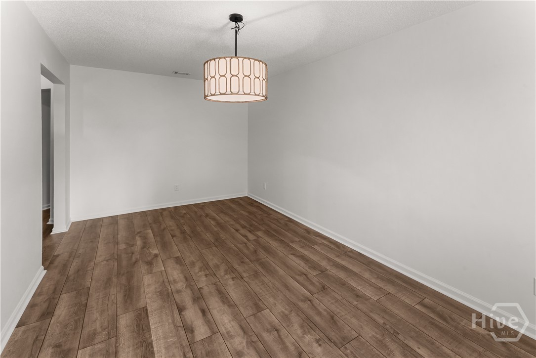 The front room could be used as an office or sitting room.