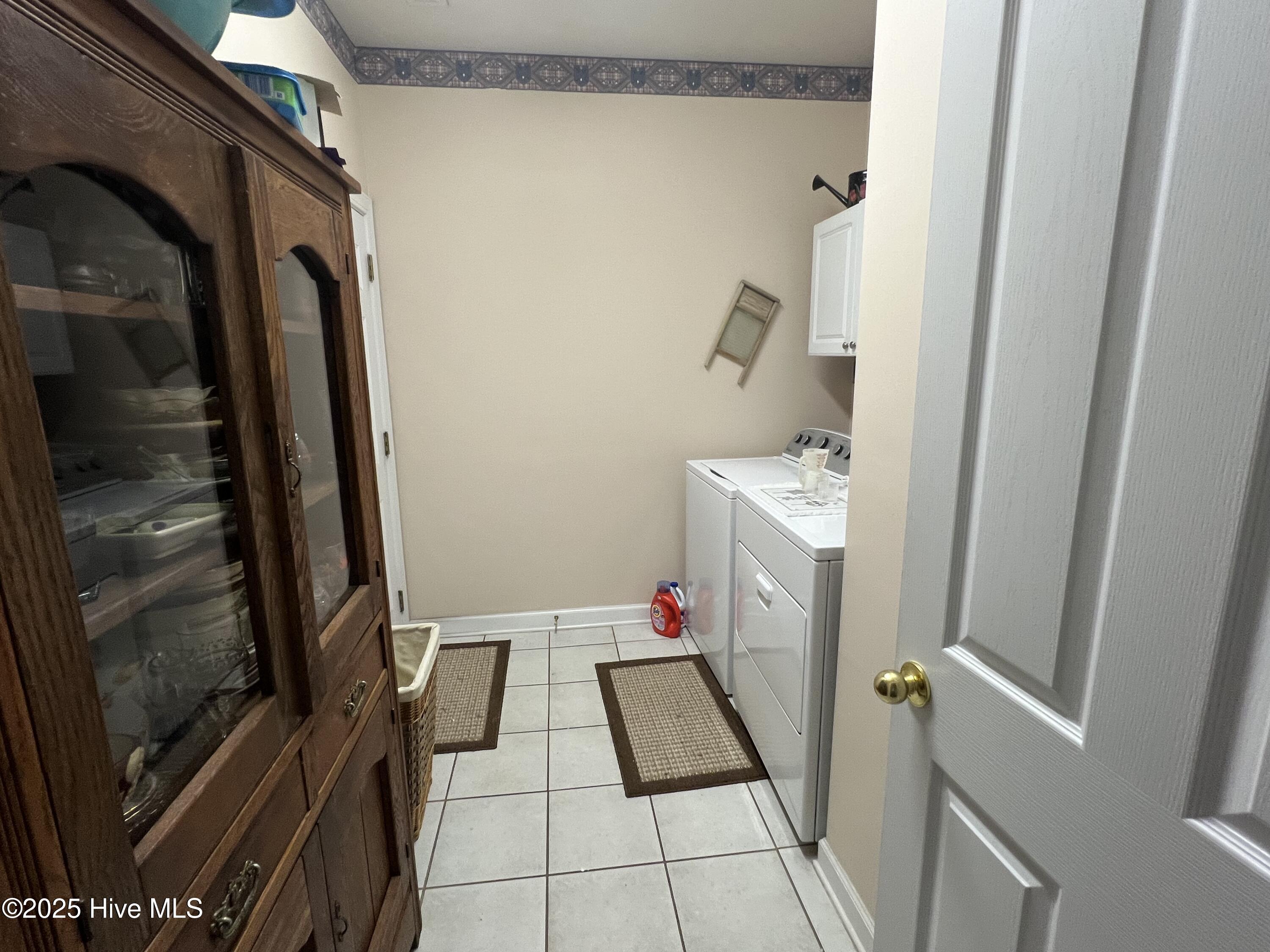 7473 Balmore Drive SW, Sunset Beach, NC 28468 – photo 24: Laundry Room