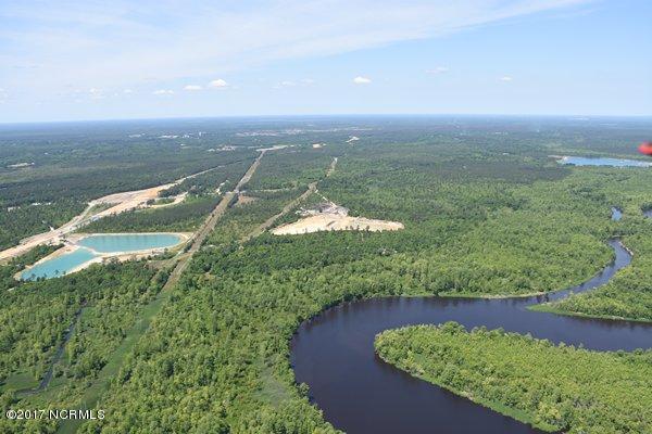 This spectacular property of 145 acres sits directly on the Cape Fear River. This property is zoned for 942 residential units. The on and off ramp for I-40 bypass is 700 ft. to the property. Just 4 miles to Downtown Wilmington from the new highway.