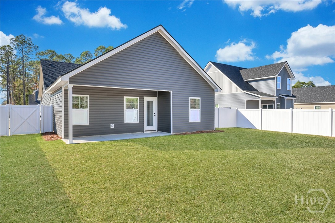 PHOTOS OF A PREVIOUSLY BUILT BRINSON PLAN BY LAWRENCE ALEXANDER HOMES.