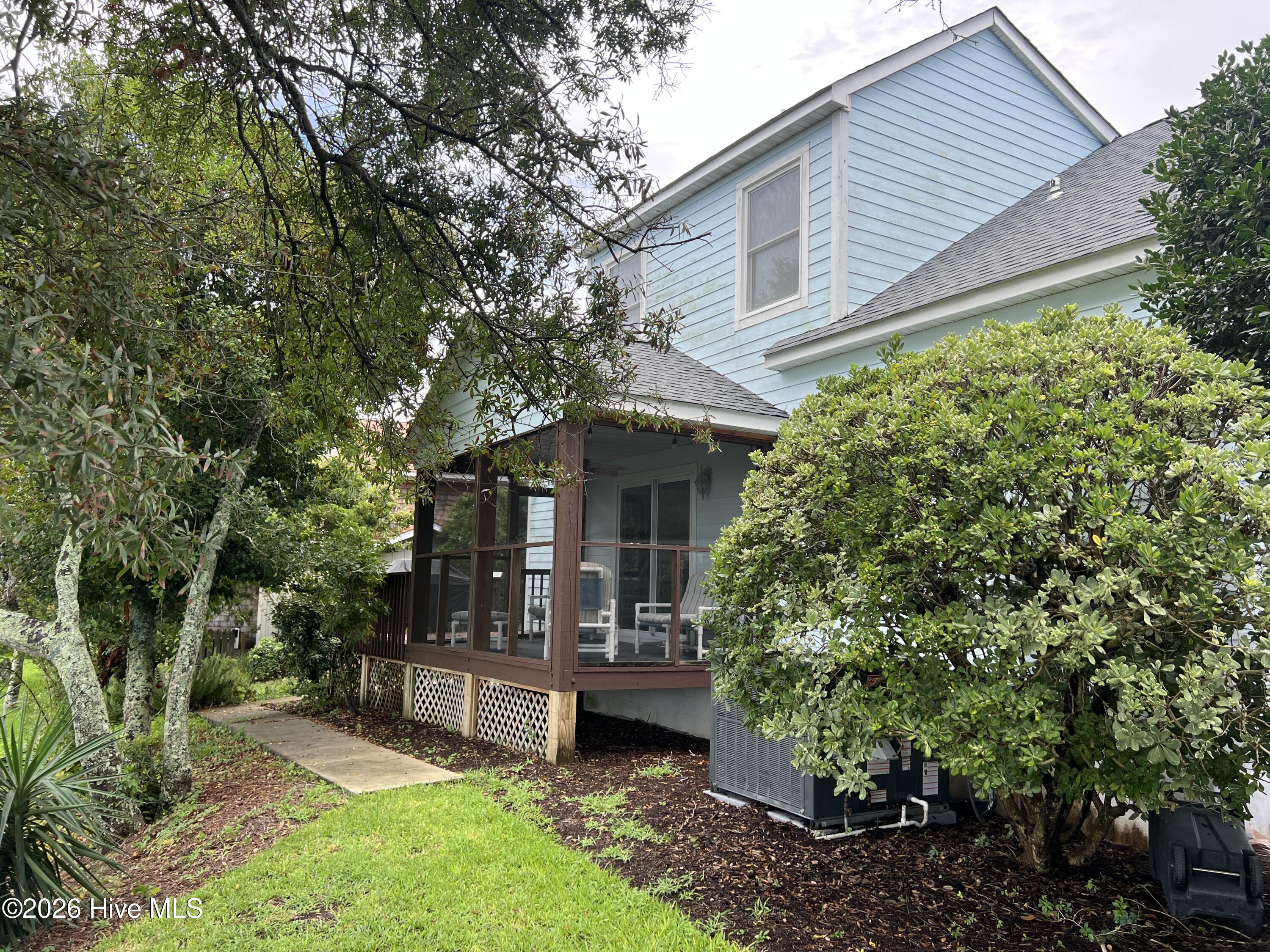 Exterior photo of 109 Oakleaf Drive, Pine Knoll Shores, NC 28512. MLS: 100598267