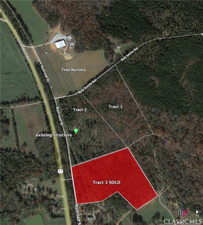 Live out your dream on 26 picturesque and private acres of mature hardwoods in rural Oglethorpe County. Tract 3 sold for $120,000 in April of 2023 and now Tracts 1 and 2 are each available together. Tract 2 includes the bones of a victorian farm house featuring salvageable old-growth framing and trim, pressed tin shingles and two chimney stacks, the house would be a great starting point for a vibe-y restoration project or a source of materials for a new build with tons of authentic character.  The property is zoned agricultural (non-industrial) and divided into two tracts of approximately 13 acres each. There is no city water or sewer on the property but level 3 soil tests indicating suitability for septic are available for both tracts. Tract 2 has an electric service drop, a capped well and some old road beds which are navigable by 4 wheel drive. There are streams on both TractsUnion Point Rd (Hwy 77) is conveniently located less than 150 feet from the property line but buffered by a 60ft forested rail bed slated to become part of the Firefly Trail. The charming town of Crawford and laid back Lexington are both about 7 miles by road. Maxey's is 3.8 miles by road and Athens is under 20 miles.The north boundaries of both tracts abut a tree nursery. The parcel has approximately 950 feet of frontage on Railroad Road (paved) and 1060 feet of frontage on Bob Smith Rd (gravel)