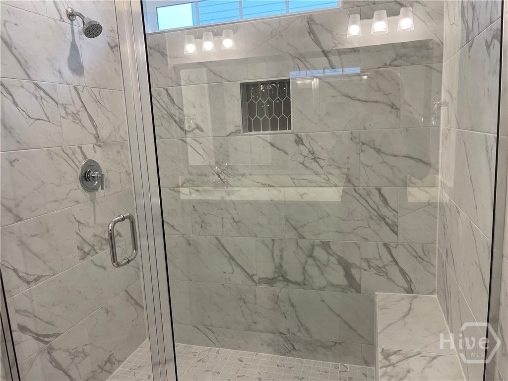 Tiled 6' ft Shower w/bench in Primary