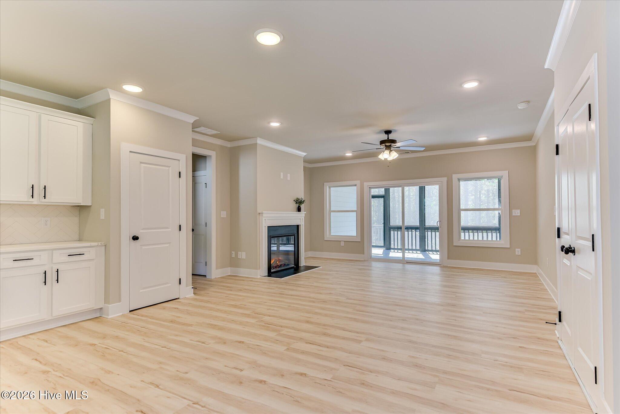Open, split floor plan, kitchen/living/dining, an abundance of natural light