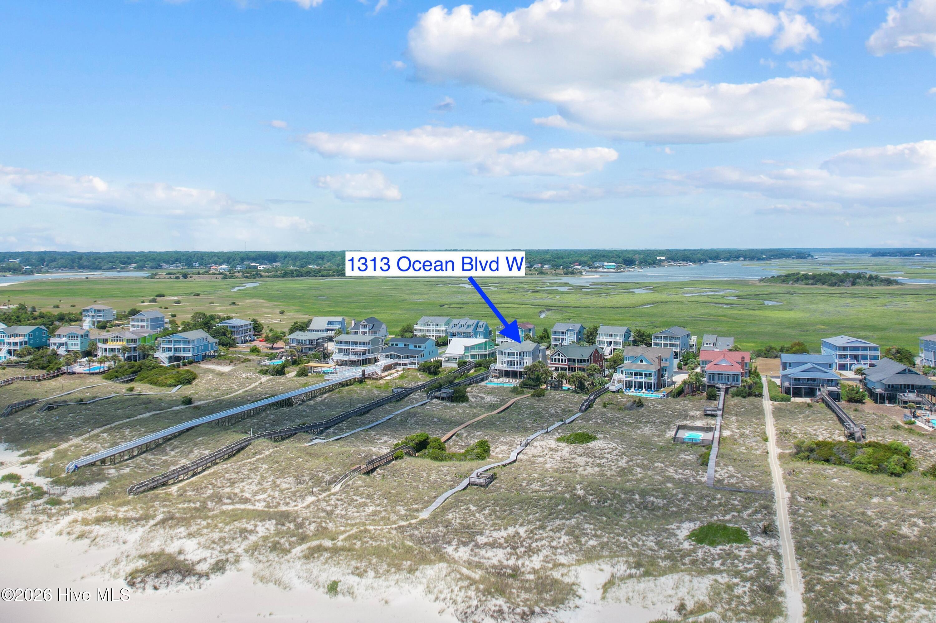 Exterior photo of 1313 Ocean Boulevard W, Holden Beach, NC 28462. MLS: 100588137