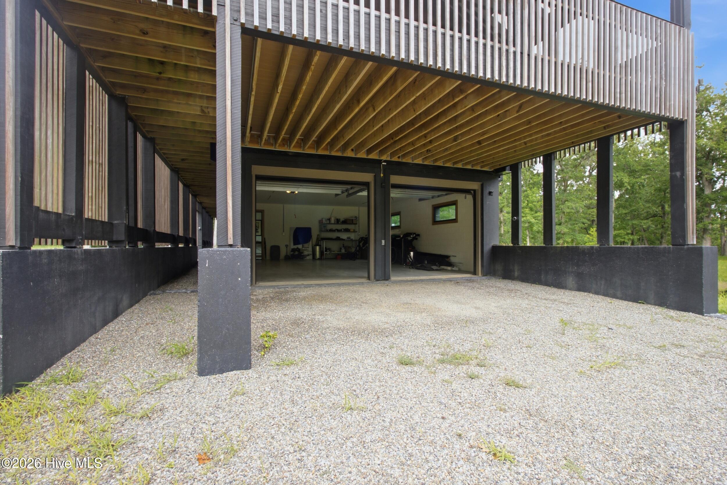 Attached 2 Car Garage & 2 Car Carport