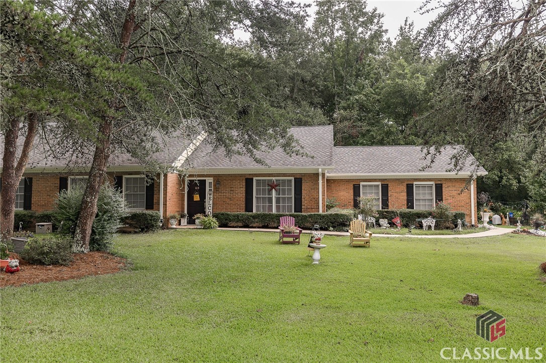 Welcome to 115 Friendship Place, situated just steps away from the Firefly Trail and the charming downtown Winterville area! This lovely 2 bedroom, 2 bath brick attached home is so perfectly cozy, with all the amenities you need for comfortable living, an attached garage, plus a great spacious yard. As you enter the home, you'll be greeted by a warm and inviting living area, plenty of windows for natural light, and ample space for relaxing or entertaining. Through the formal dining room you’ll find the kitchen featuring plenty of counter and cabinet space and a breakfast area. Both bedrooms are spacious and comfortable, with carpeting and plenty of closet space. You'll love the convenience of having two full bathrooms, one of which is en-suite to the primary bedroom. Outside, you'll find a private patio area, perfect for enjoying your morning coffee or hosting a summer BBQ. With its prime location in Winterville, you'll have easy access to all the shopping, dining, and entertainment that this charming town has to offer.